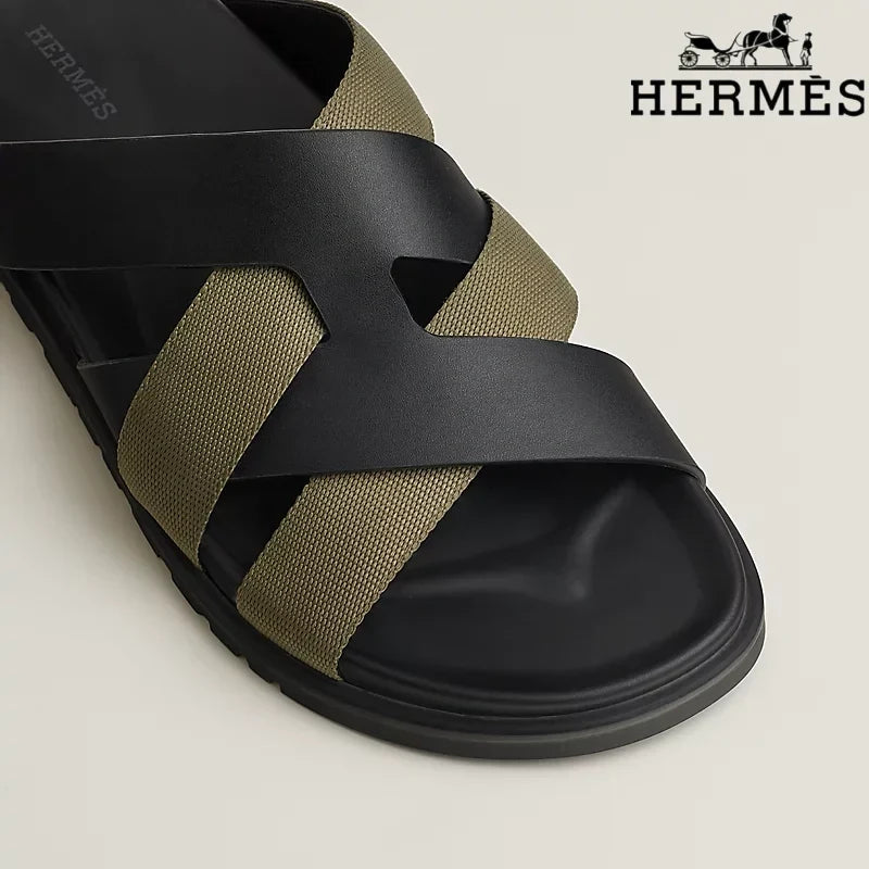 Herm¨¨s Black Leather and Olive Webbing Cross-Strap Slide Sandals