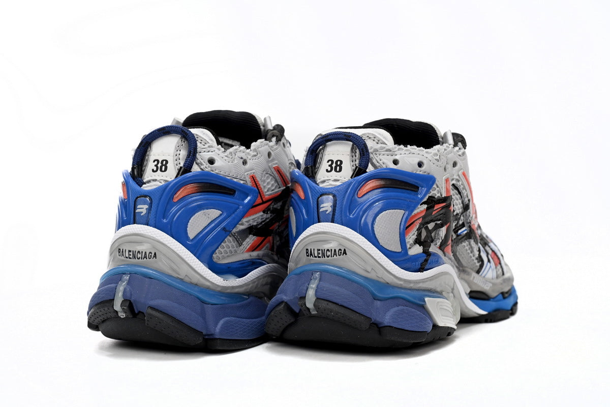 Balenciaga men's shoes Track Runner Sneaker ¨C Distressed Low-Top  balenciaga runners  Red, white, and blue