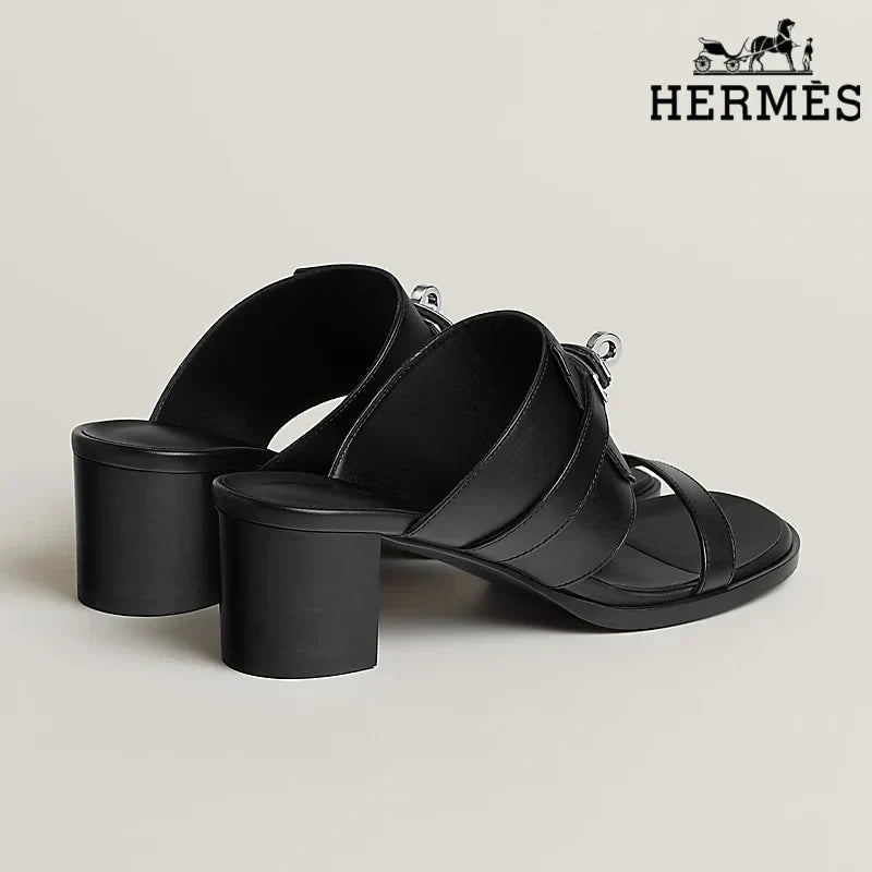 Herm¨¨s Black Smooth Leather Heeled Slide Sandals with Silver Kelly Buckle