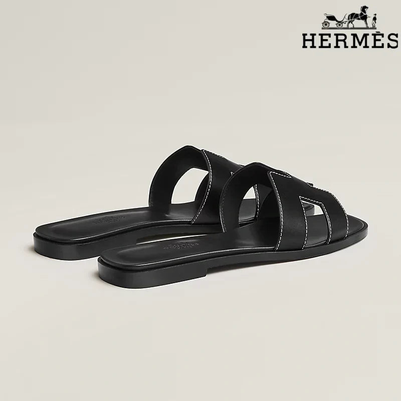 Herm¨¨s Black Leather Oran Slide Sandals