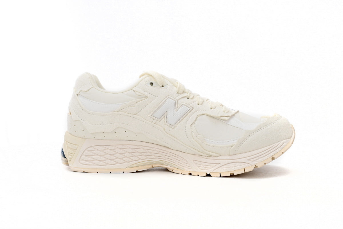 New Balance 2002R Women's & Men's Ivory Cream Distressed Retro Sneakers