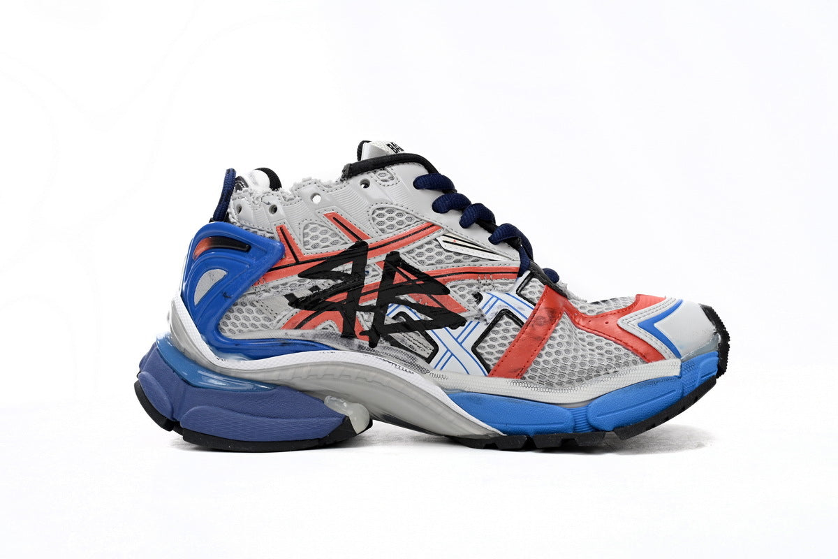 Balenciaga men's shoes Track Runner Sneaker ¨C Distressed Low-Top  balenciaga runners  Red, white, and blue