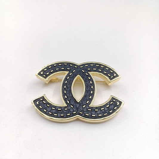 Chanel Black 18K Gold Brooch