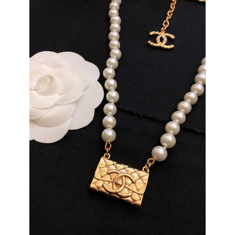 Chanel Pearl Bag Pendant 18K Gold Necklace