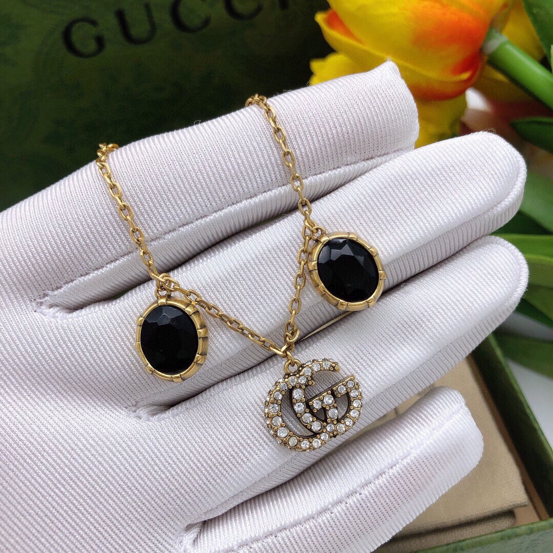 Gucci Double Black Stones 18K Gold Bracelet