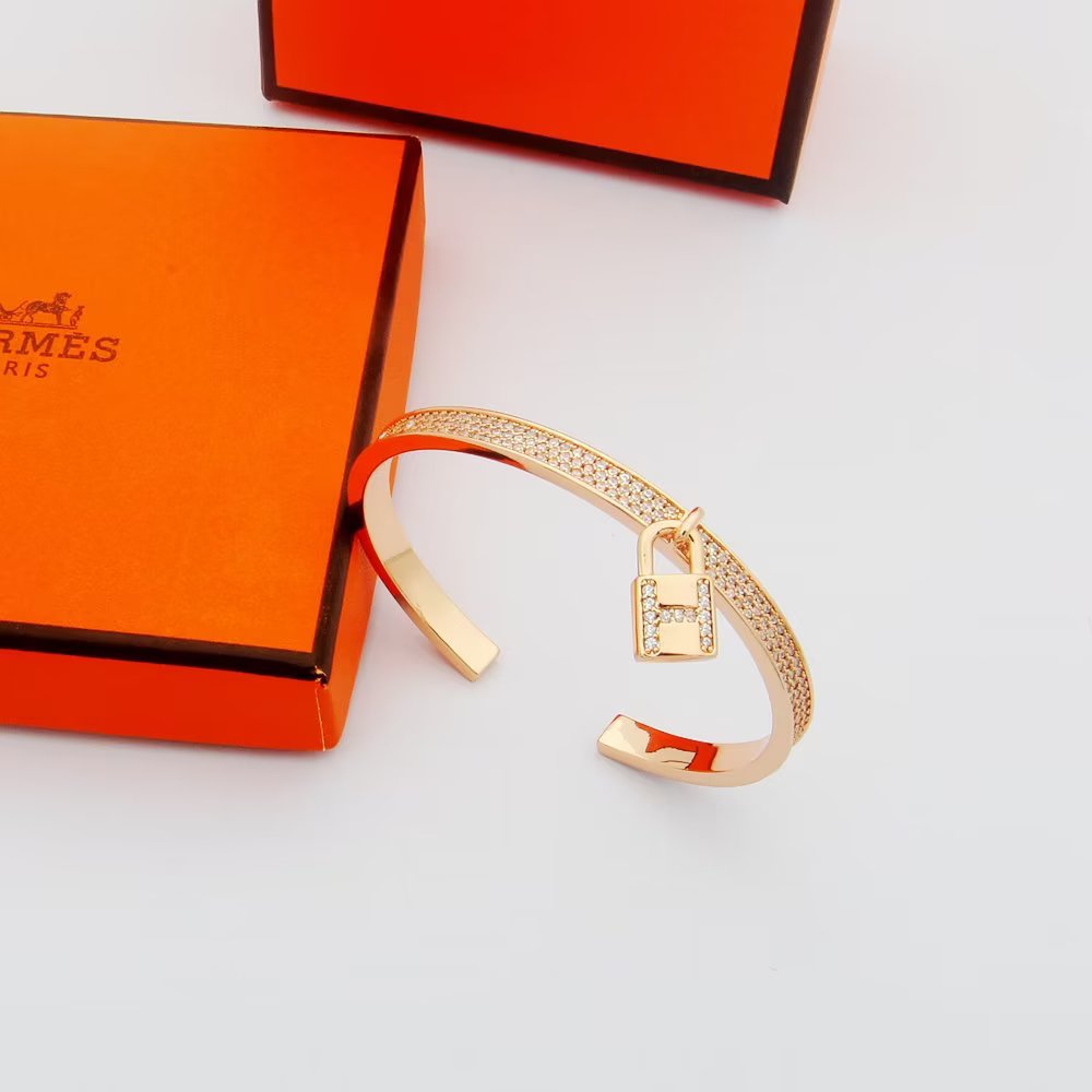 Hermes Kelly Lock Vintage Hermes 18K Gold Bracelet